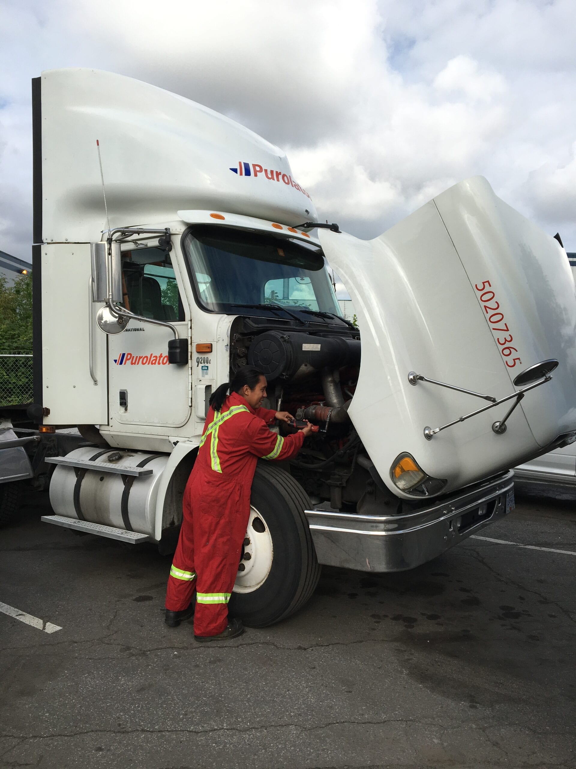 truck mechanic is having roadside truck repair on roadside in Vancouver